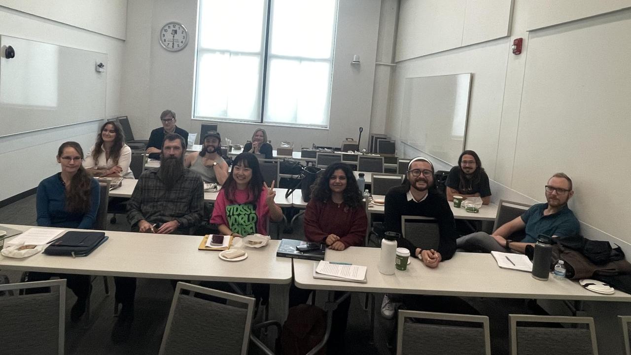 A photo of grad students in a classroom