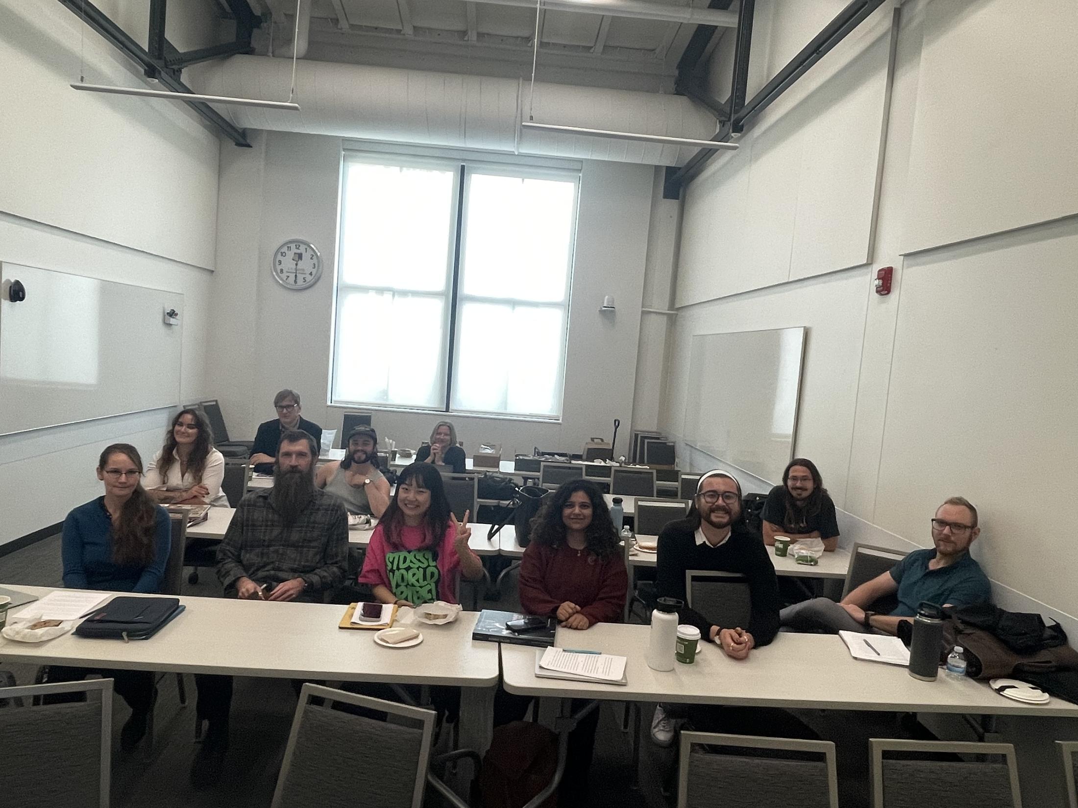 A photo of grad students in a classroom