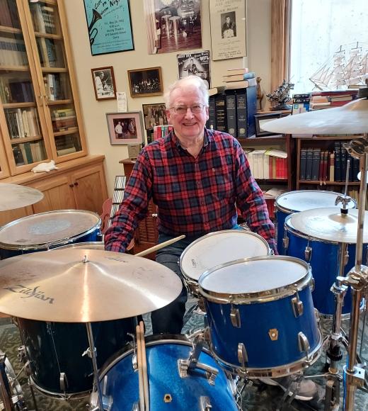 Winder McConnell behind a drum set