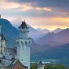 A landscape photo of a castle near dawn